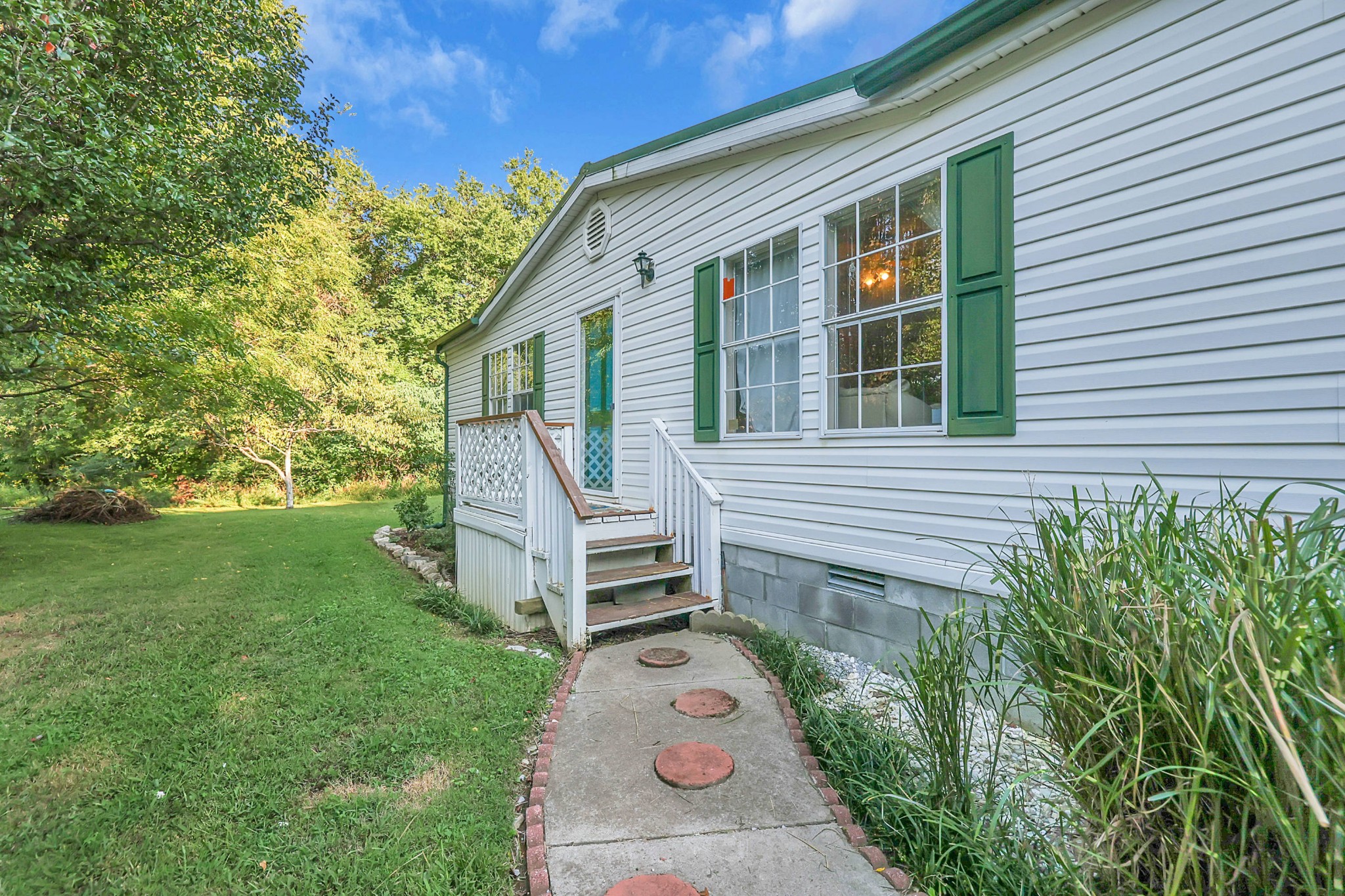 1241 Quarry Road Mount Juliet, TN 37122 - Photo 9 of 29 a front view of a house with garden