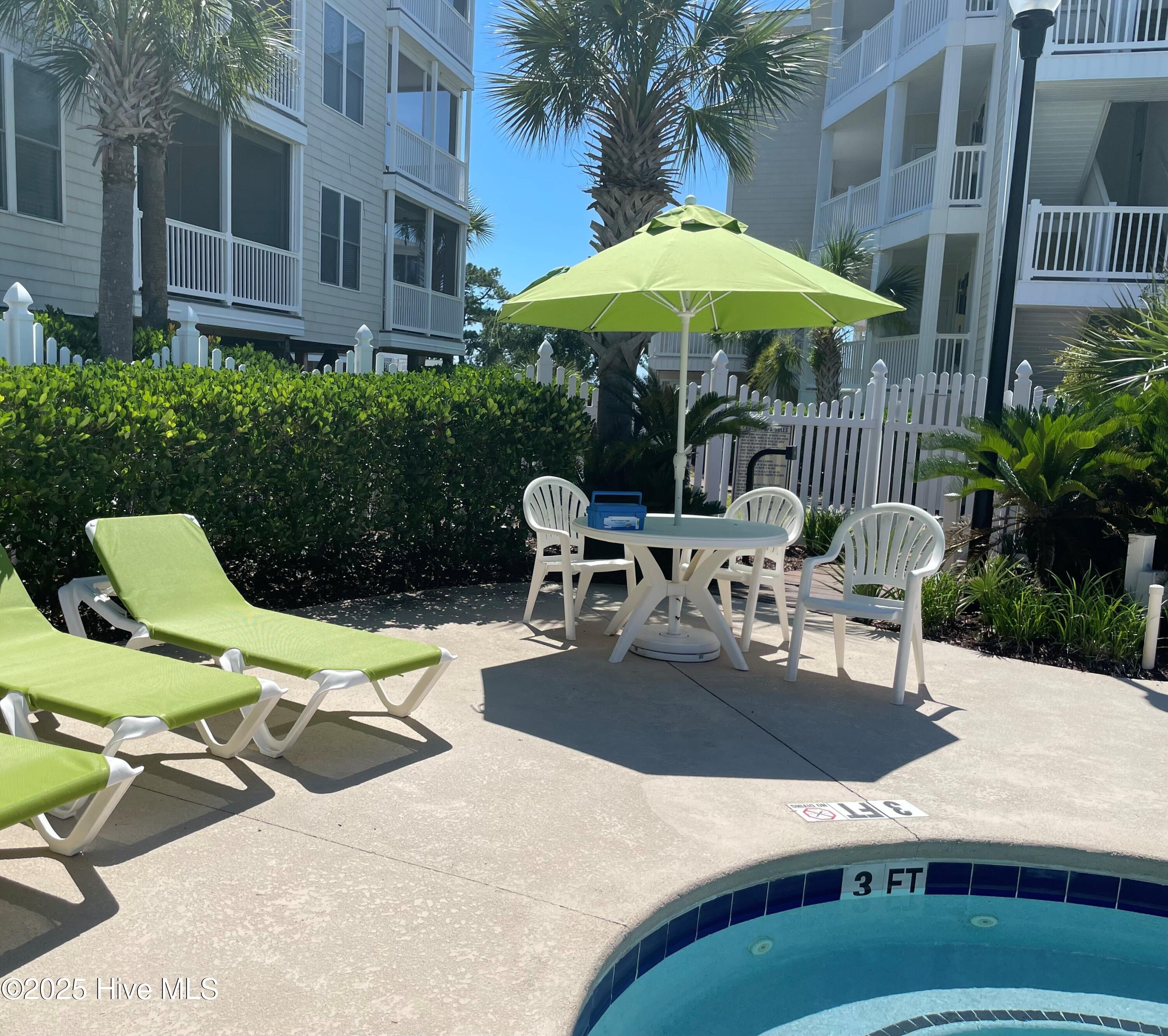 1135 Park Road Southwest, Unit 4302 Sunset Beach, NC 28468 - Photo 39 of 53 Poolside picture