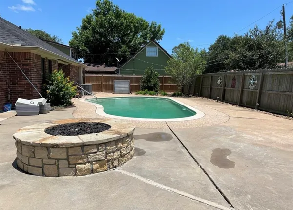 a view of a house with a swimming pool