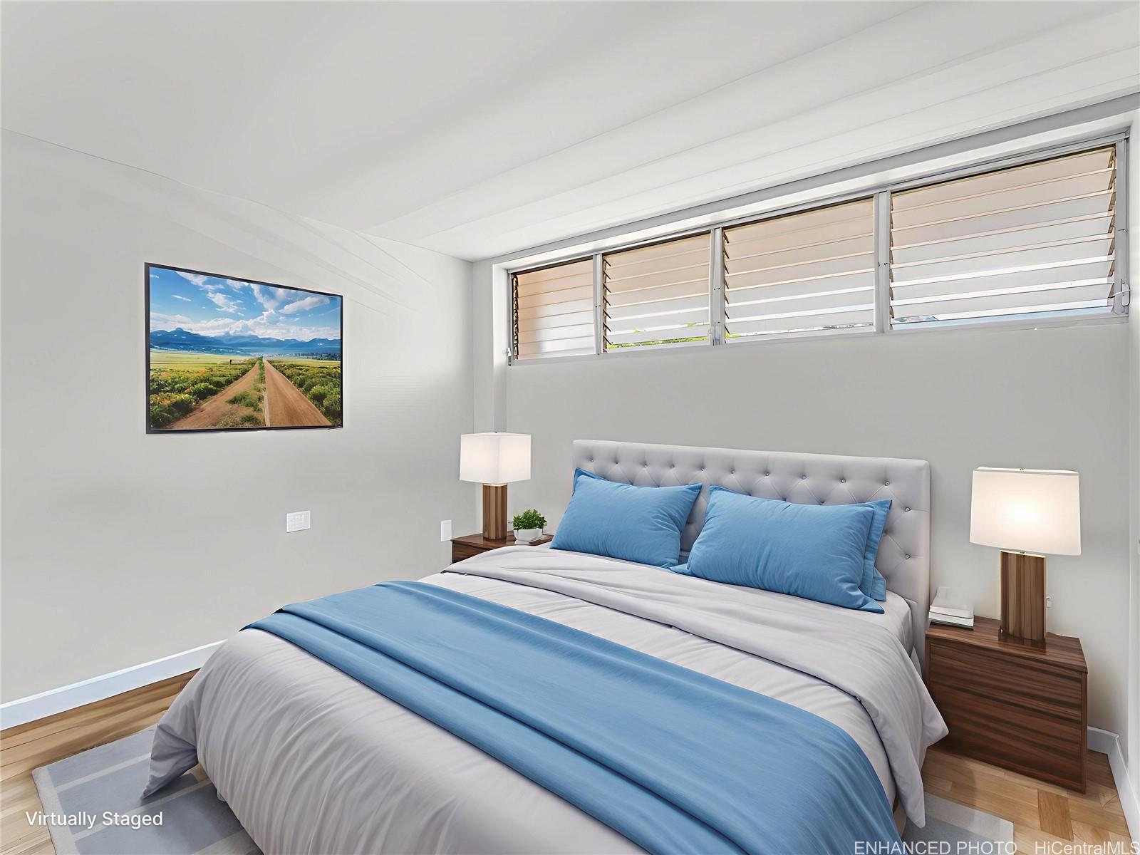 4300 Waialae Avenue, Unit B601 Honolulu, HI 96816 - Photo 12 of 18 a bedroom with bed and night stand