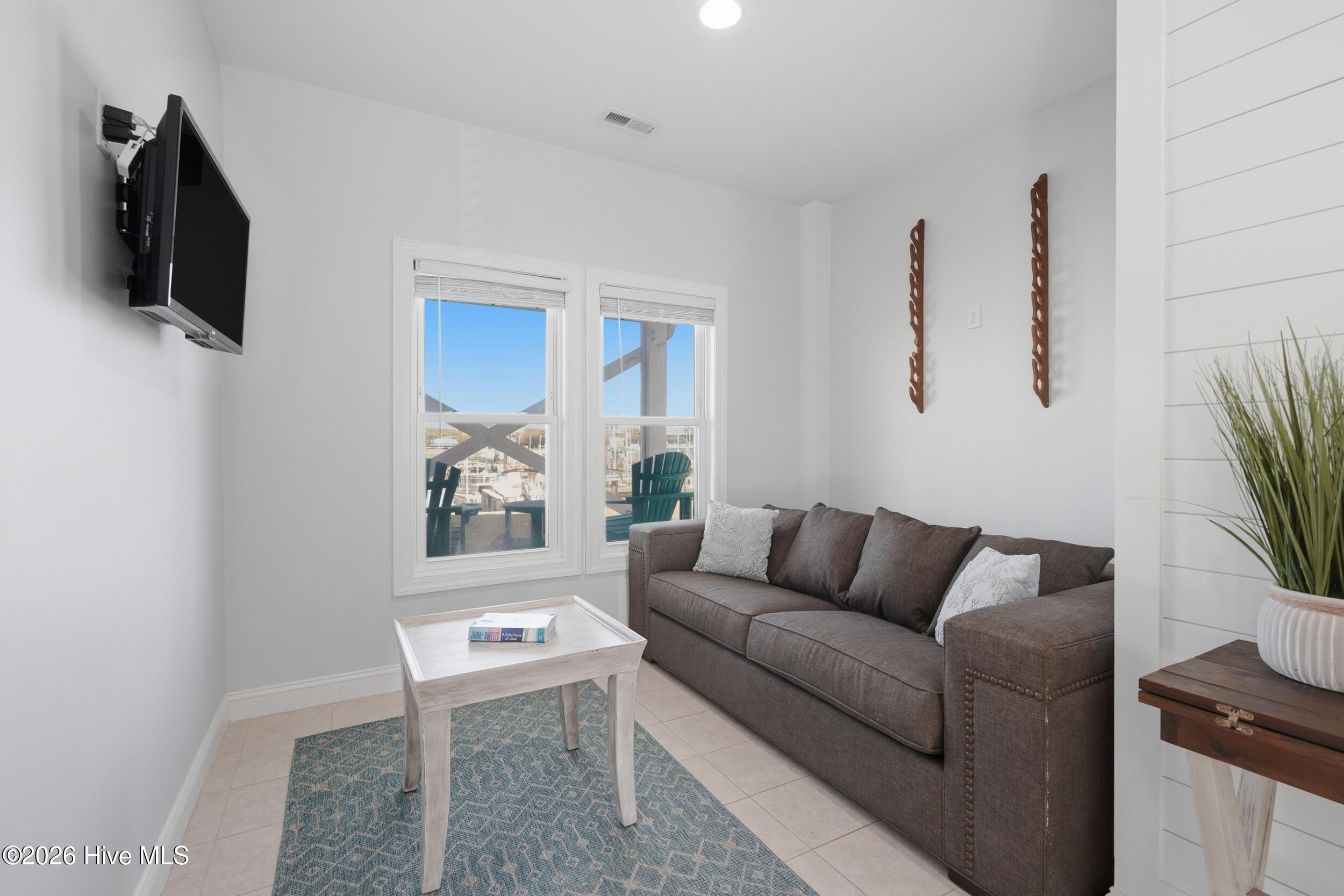 926 Observation Lane Topsail Beach, NC 28445 - Photo 8 of 75 14_sitting room
