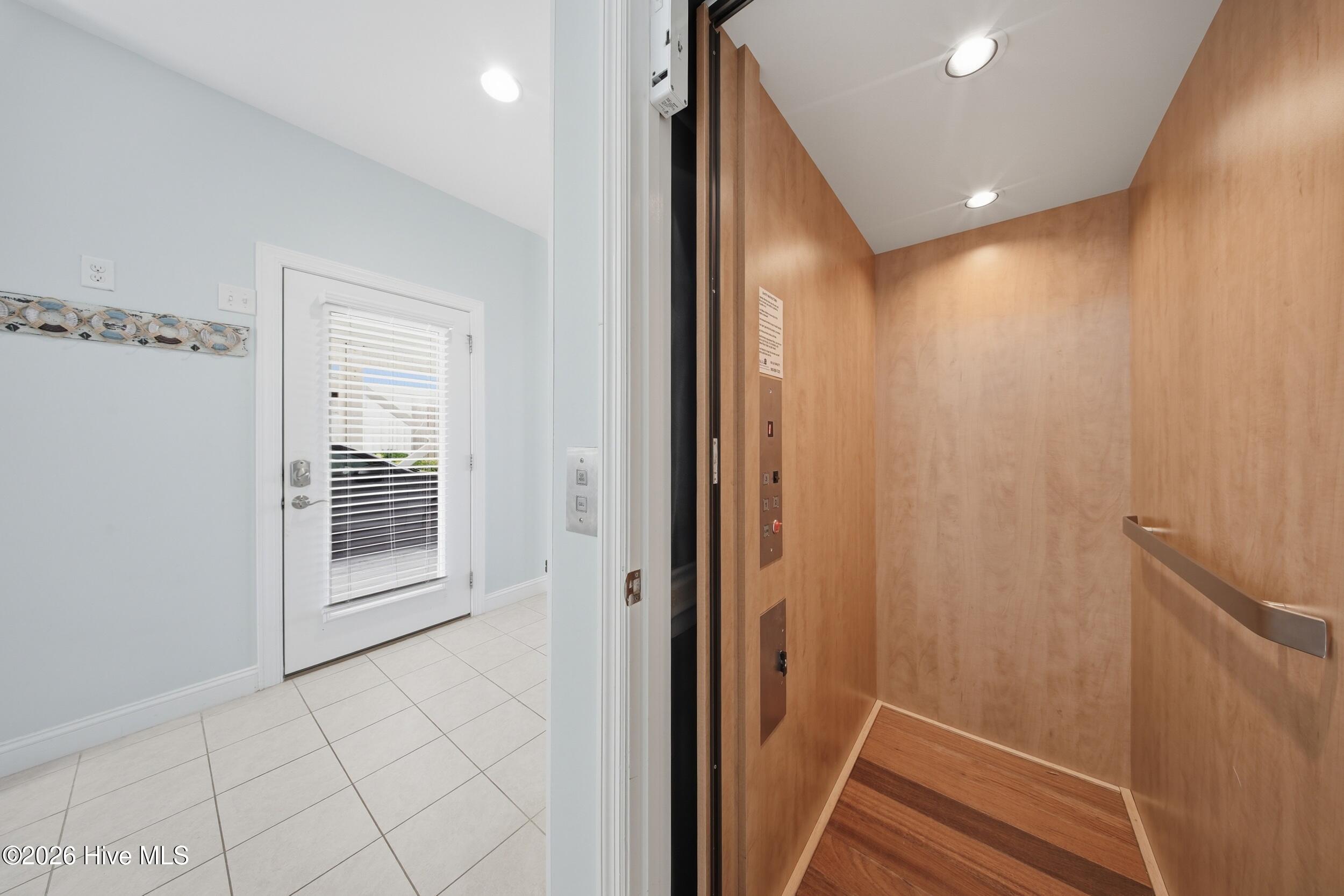 926 Observation Lane Topsail Beach, NC 28445 - Photo 10 of 75 16_elevator