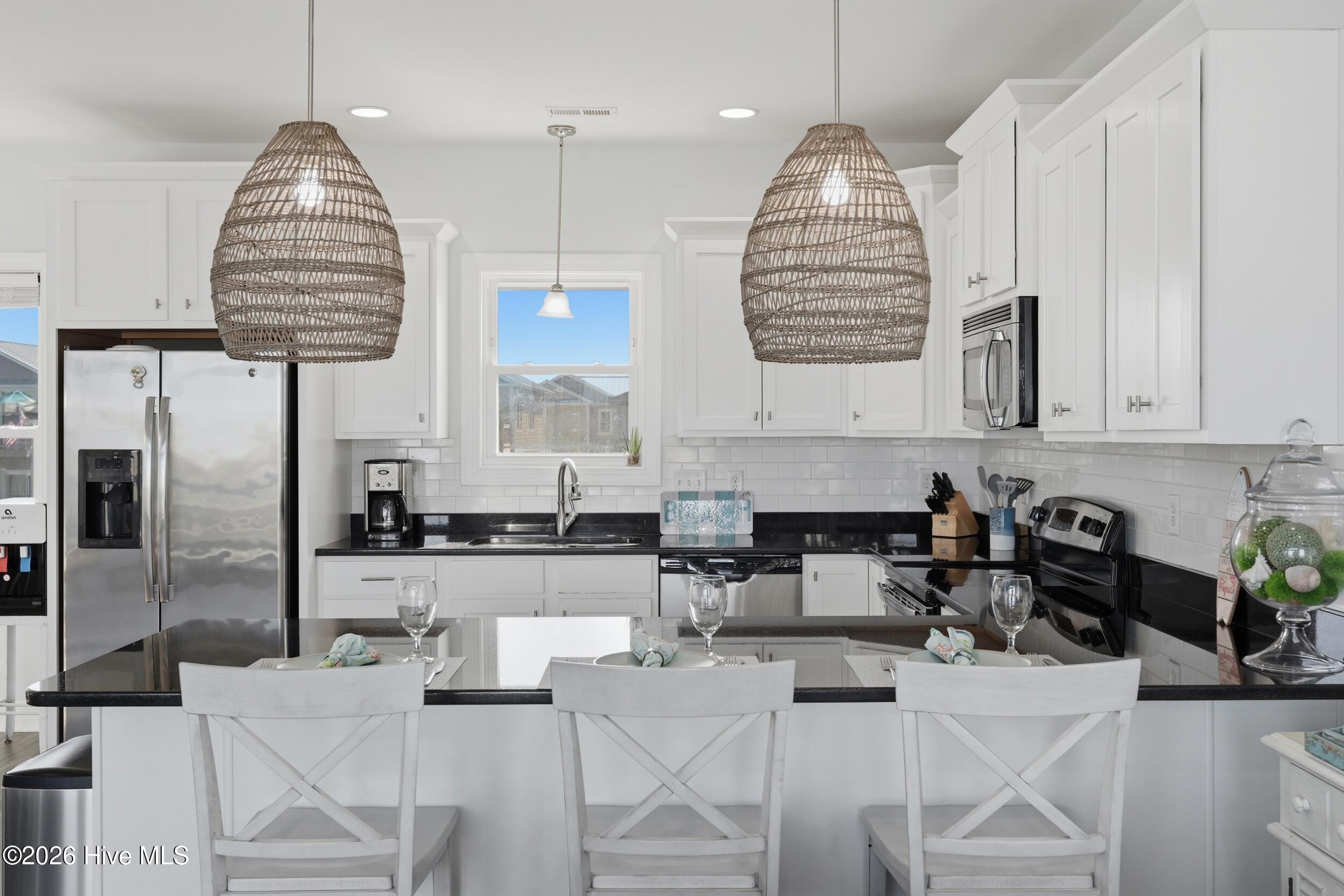 926 Observation Lane Topsail Beach, NC 28445 - Photo 31 of 75 47_kitchen