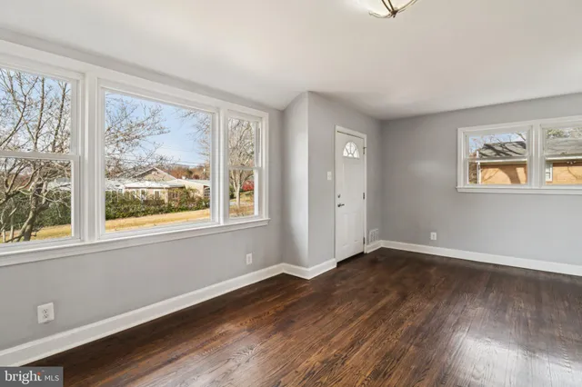 a kitchen with granite countertop a sink and a window