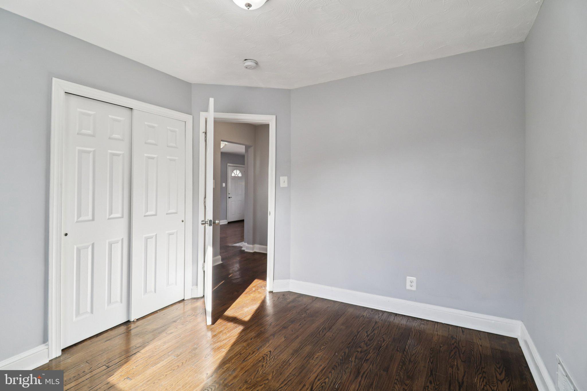 11515 Orebaugh Avenue Silver Spring, MD 20902 - Photo 18 of 69 wooden floor in an empty room