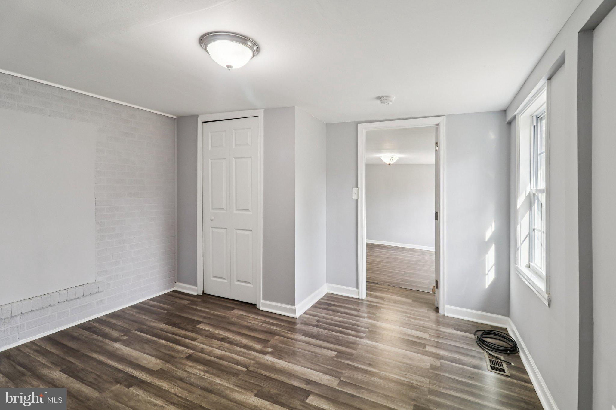 11515 Orebaugh Avenue Silver Spring, MD 20902 - Photo 30 of 69 a view of a room with wooden floor and bathroom