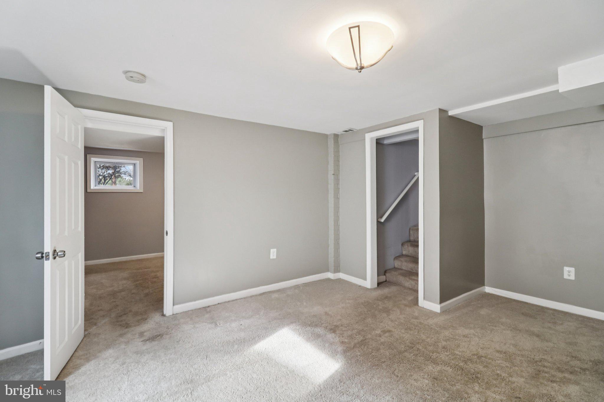 11515 Orebaugh Avenue Silver Spring, MD 20902 - Photo 33 of 69 an empty room with closet and windows