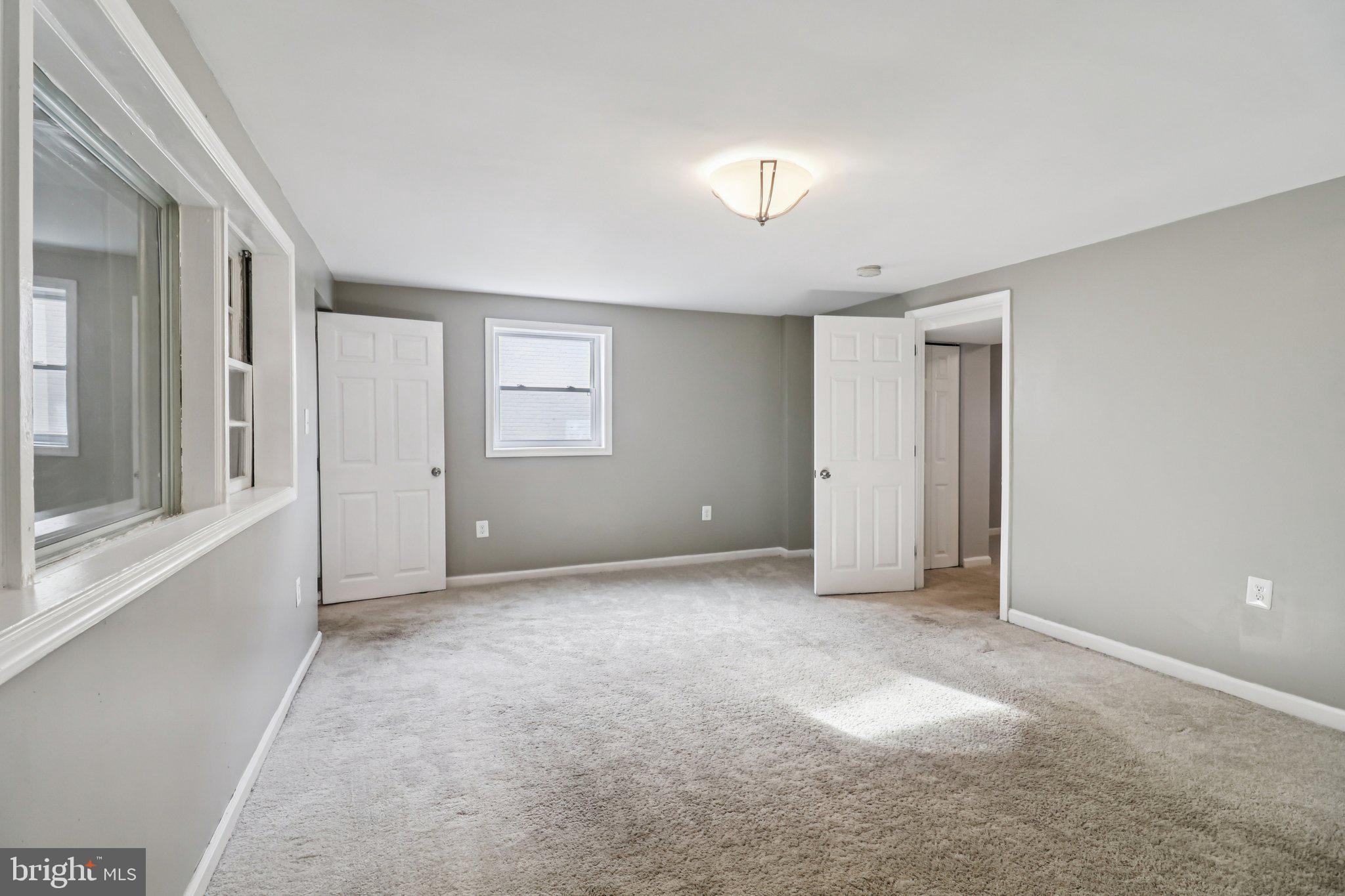 11515 Orebaugh Avenue Silver Spring, MD 20902 - Photo 34 of 69 a view of an empty room with a window
