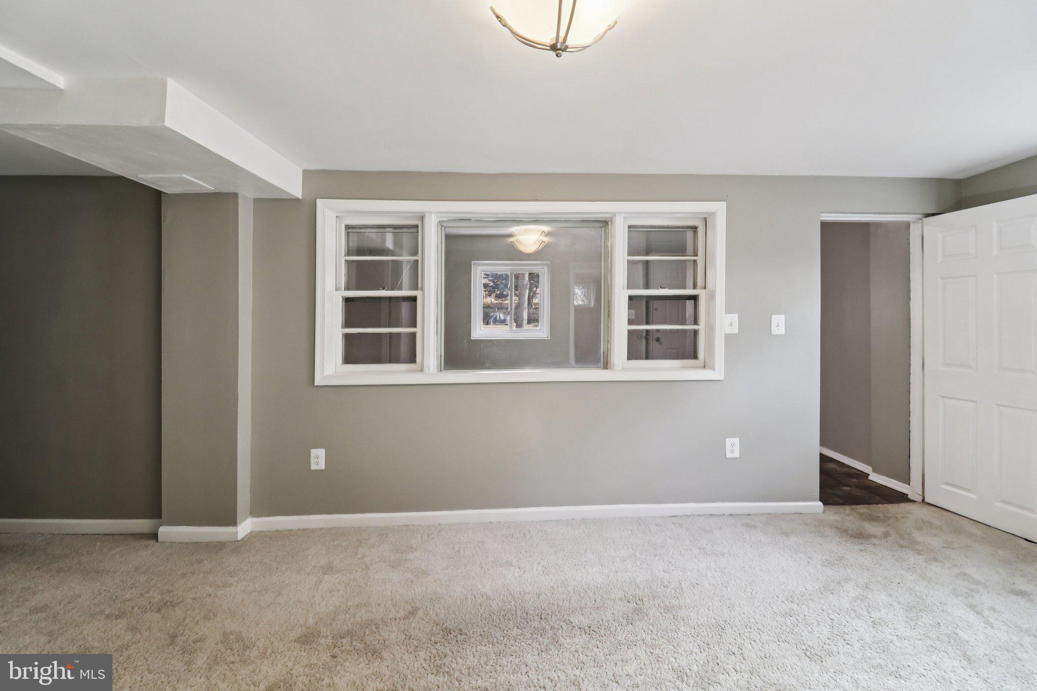 11515 Orebaugh Avenue Silver Spring, MD 20902 - Photo 35 of 69 a view of an empty room with a window