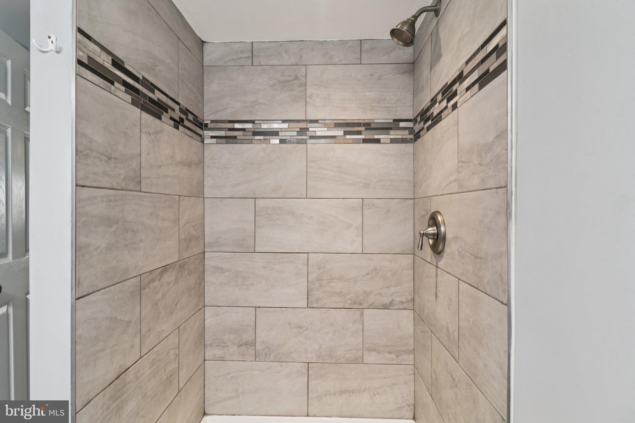 11515 Orebaugh Avenue Silver Spring, MD 20902 - Photo 42 of 69 a bathroom with a shower