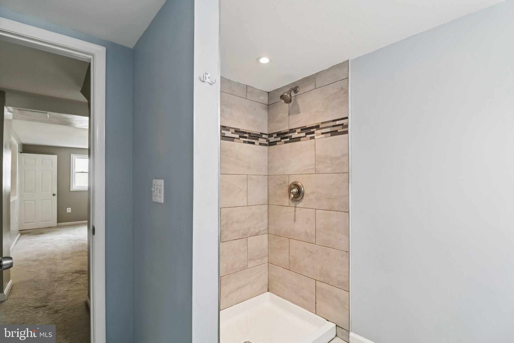 11515 Orebaugh Avenue Silver Spring, MD 20902 - Photo 44 of 69 a bathroom with a shower