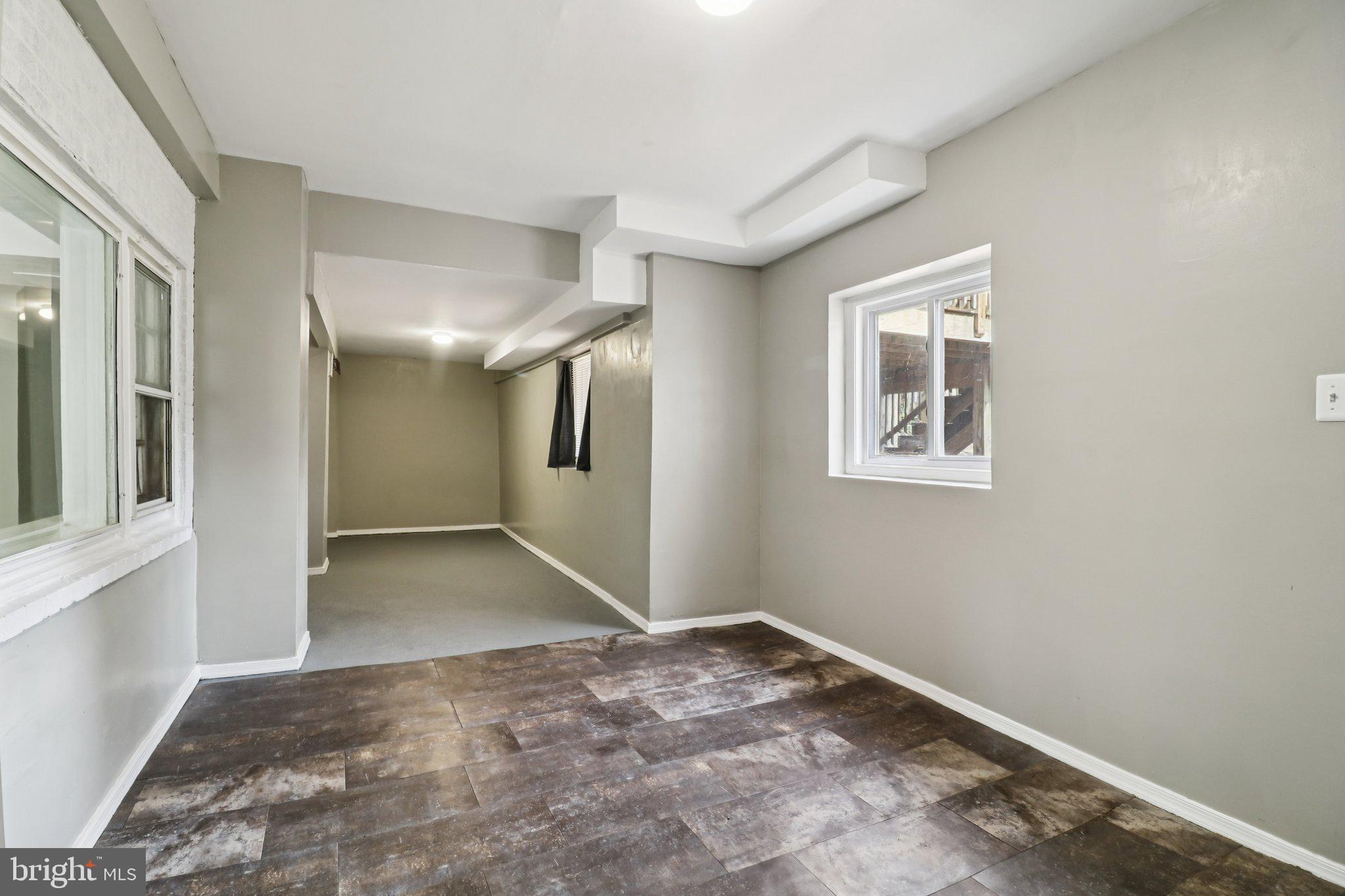 11515 Orebaugh Avenue Silver Spring, MD 20902 - Photo 45 of 69 an empty room with a empty space and windows