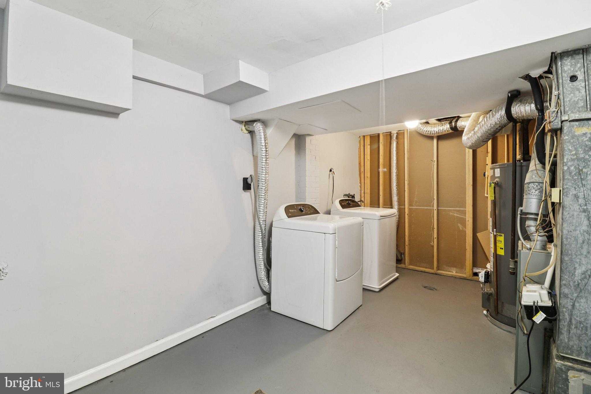 11515 Orebaugh Avenue Silver Spring, MD 20902 - Photo 52 of 69 a view of a storage & utility room with washer and dryer