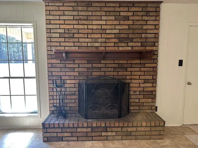 a living room with a fireplace