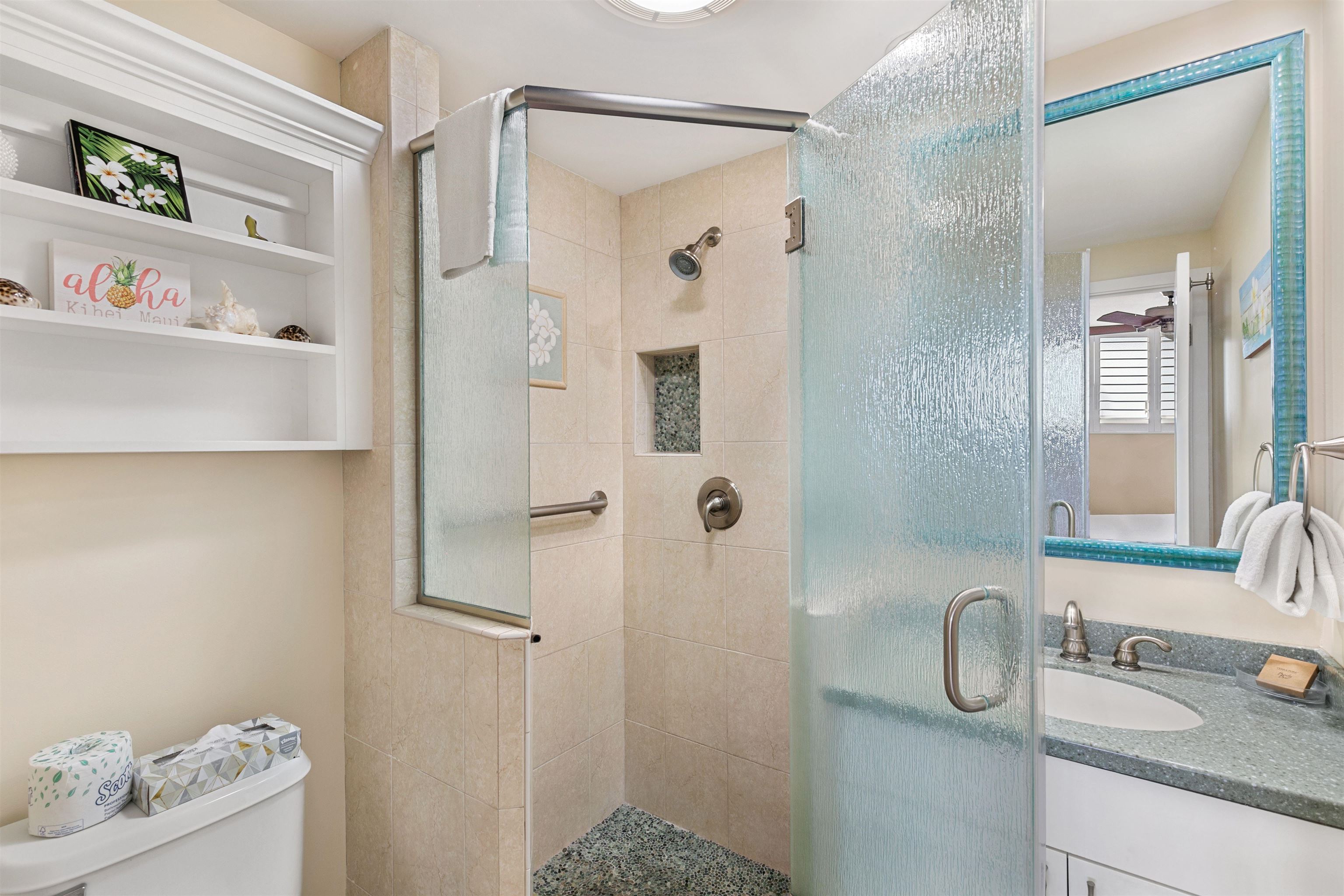 2480 South Kihei Road, Unit 702 Kihei, HI 96753 - Photo 13 of 24 a bathroom with a granite countertop sink and a mirror