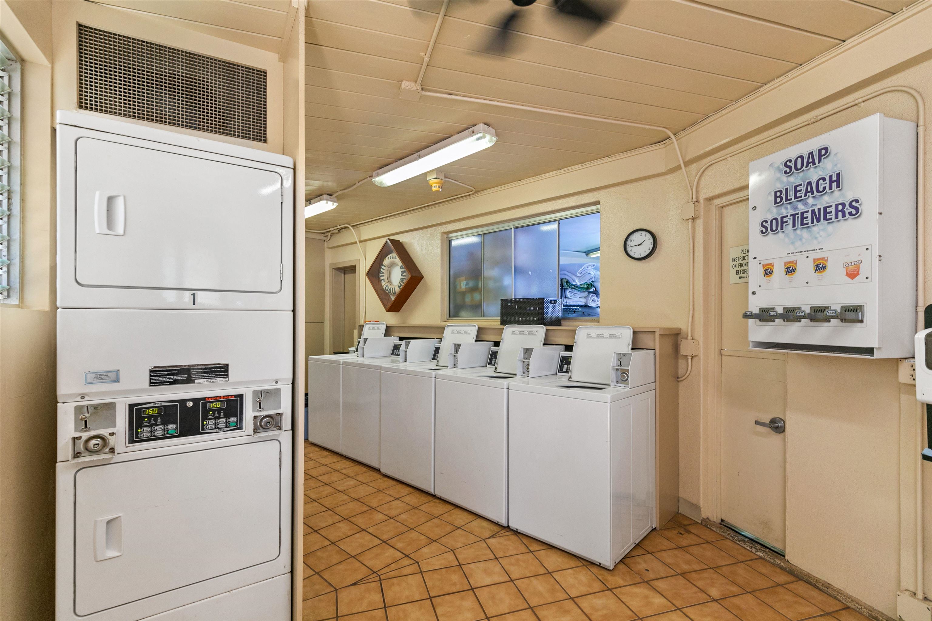 2480 South Kihei Road, Unit 702 Kihei, HI 96753 - Photo 24 of 24 a kitchen with a refrigerator and a stove