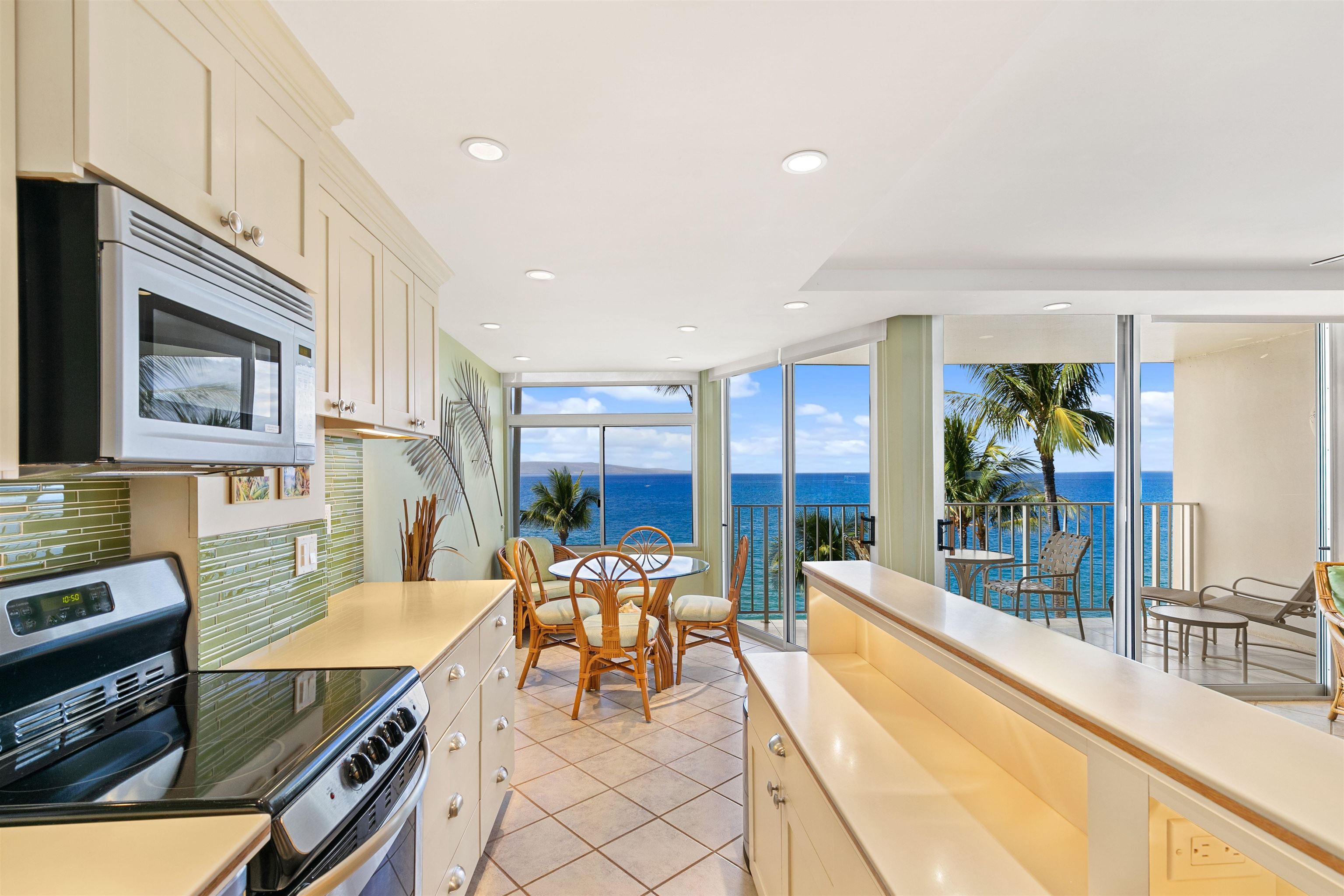 2480 South Kihei Road, Unit 702 Kihei, HI 96753 - Photo 8 of 24 a lobby with furniture and outdoor view