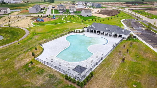 a view of swimming pool with a garden