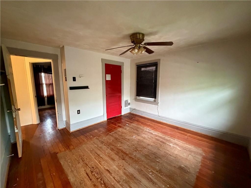118 Ida Avenue Donora, PA 15033 - Photo 10 of 18 a view of empty room with wooden floor