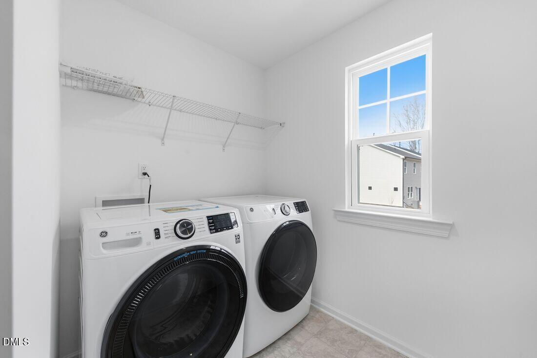 1208 Condor Jct Road Wendell, NC 27591 - Photo 25 of 57 a utility room with dryer and washer