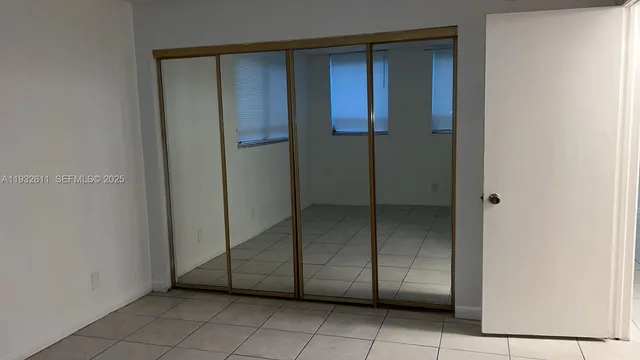 a view of entryway with white walls