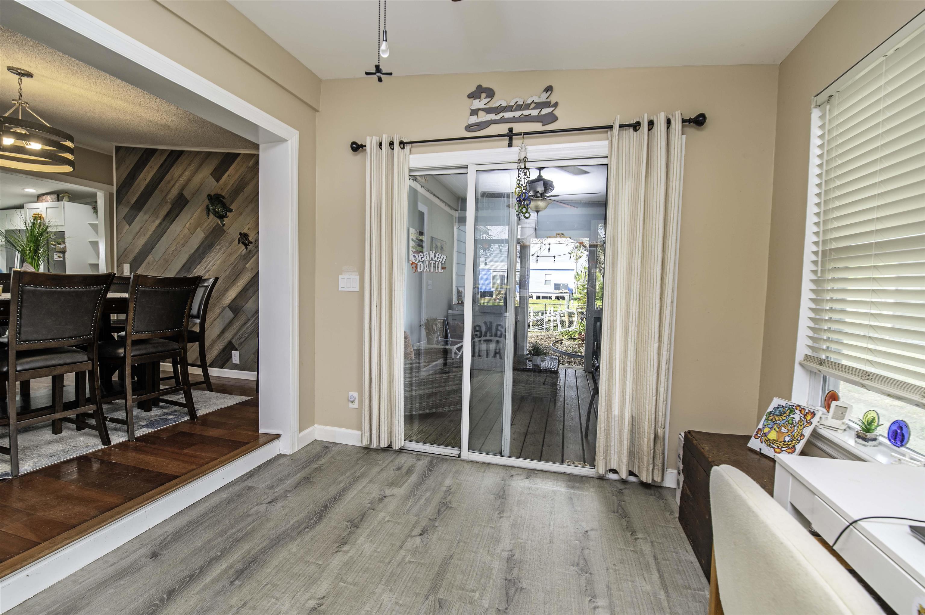 266 Pizarro Road St. Augustine, FL 32080 - Photo 12 of 26 a view of a hallway to a livingroom with furniture