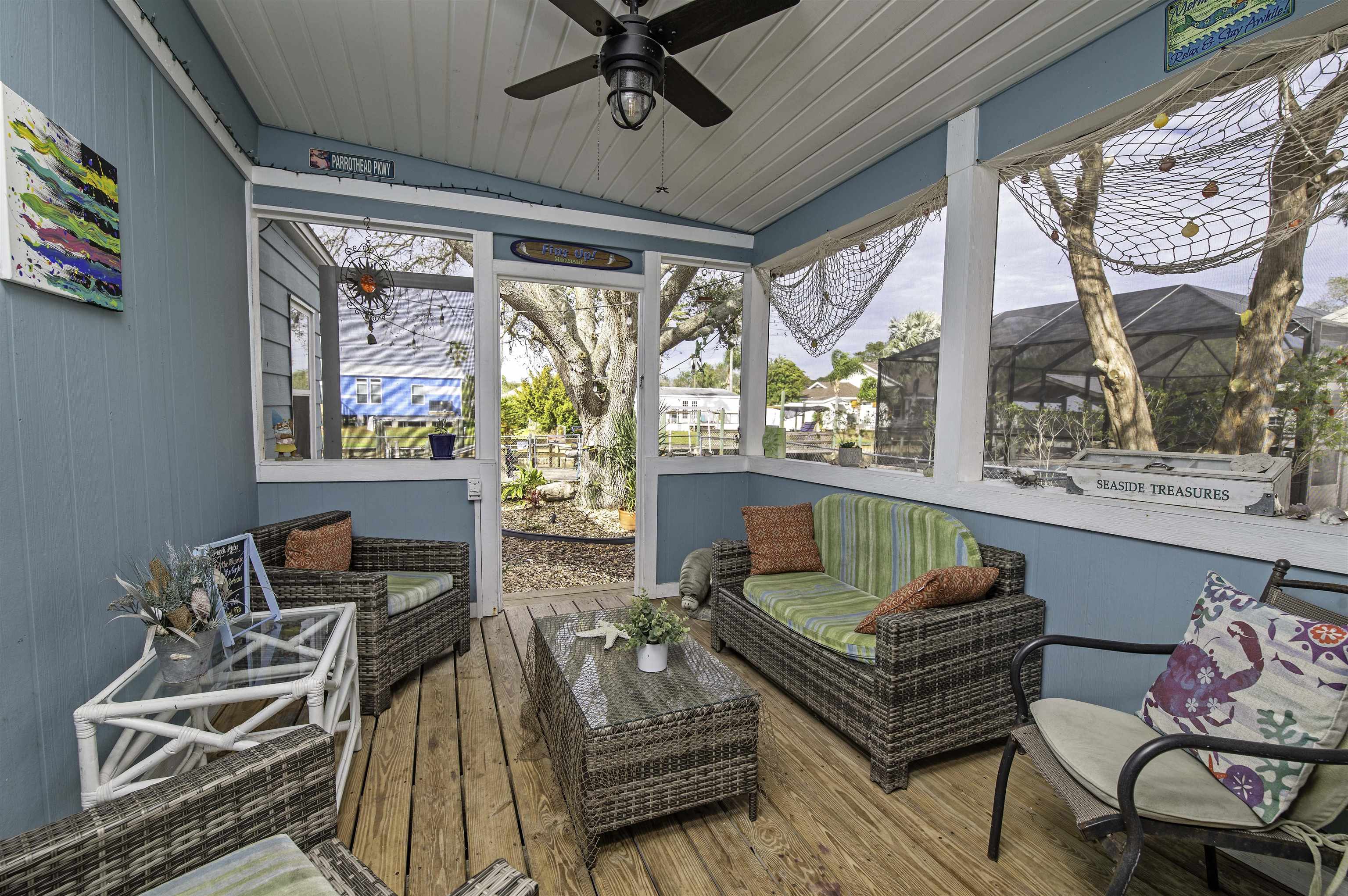 266 Pizarro Road St. Augustine, FL 32080 - Photo 13 of 26 a living room with furniture and a large window