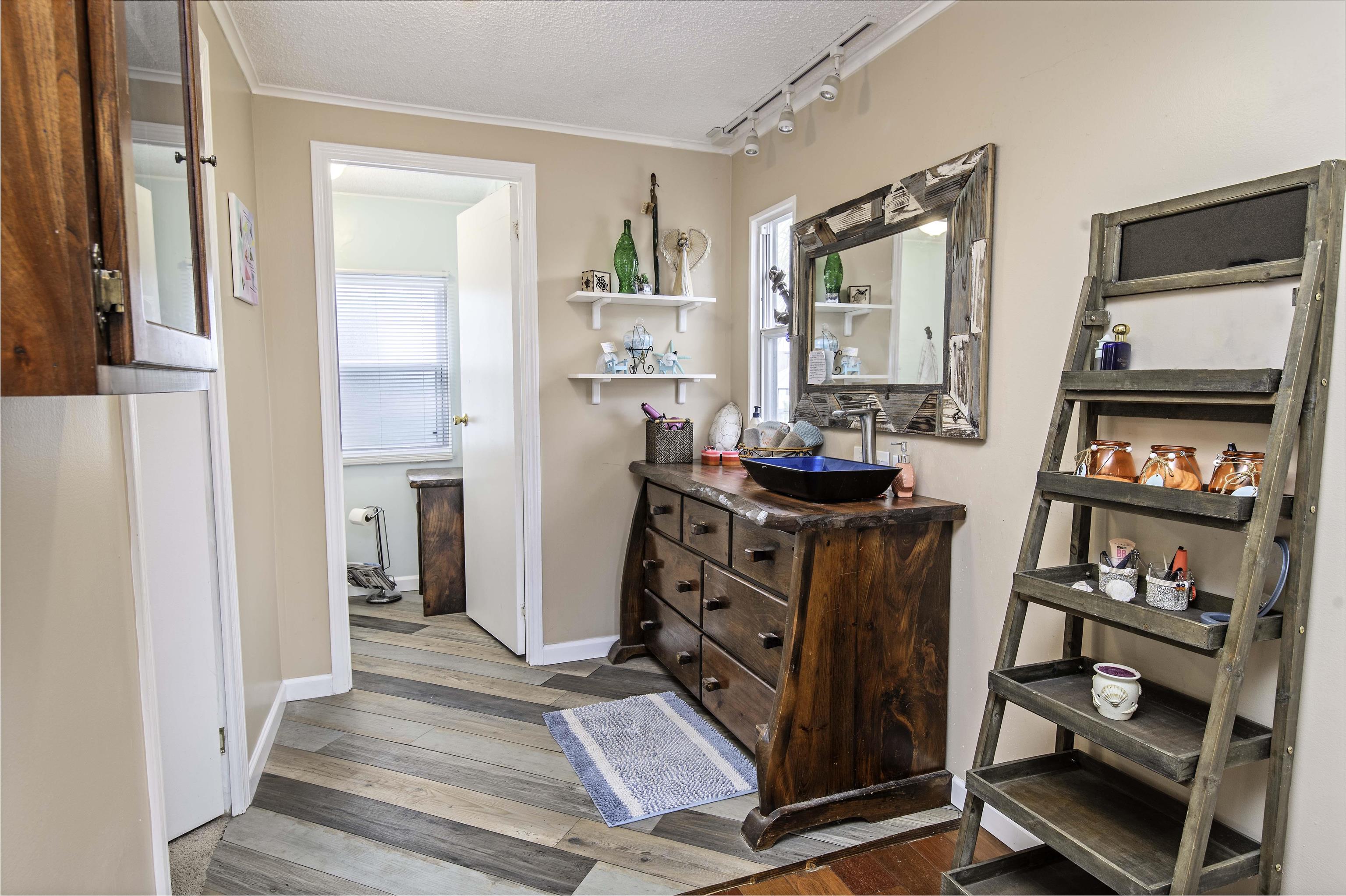 266 Pizarro Road St. Augustine, FL 32080 - Photo 16 of 26 a view of a workspace with furniture and a window