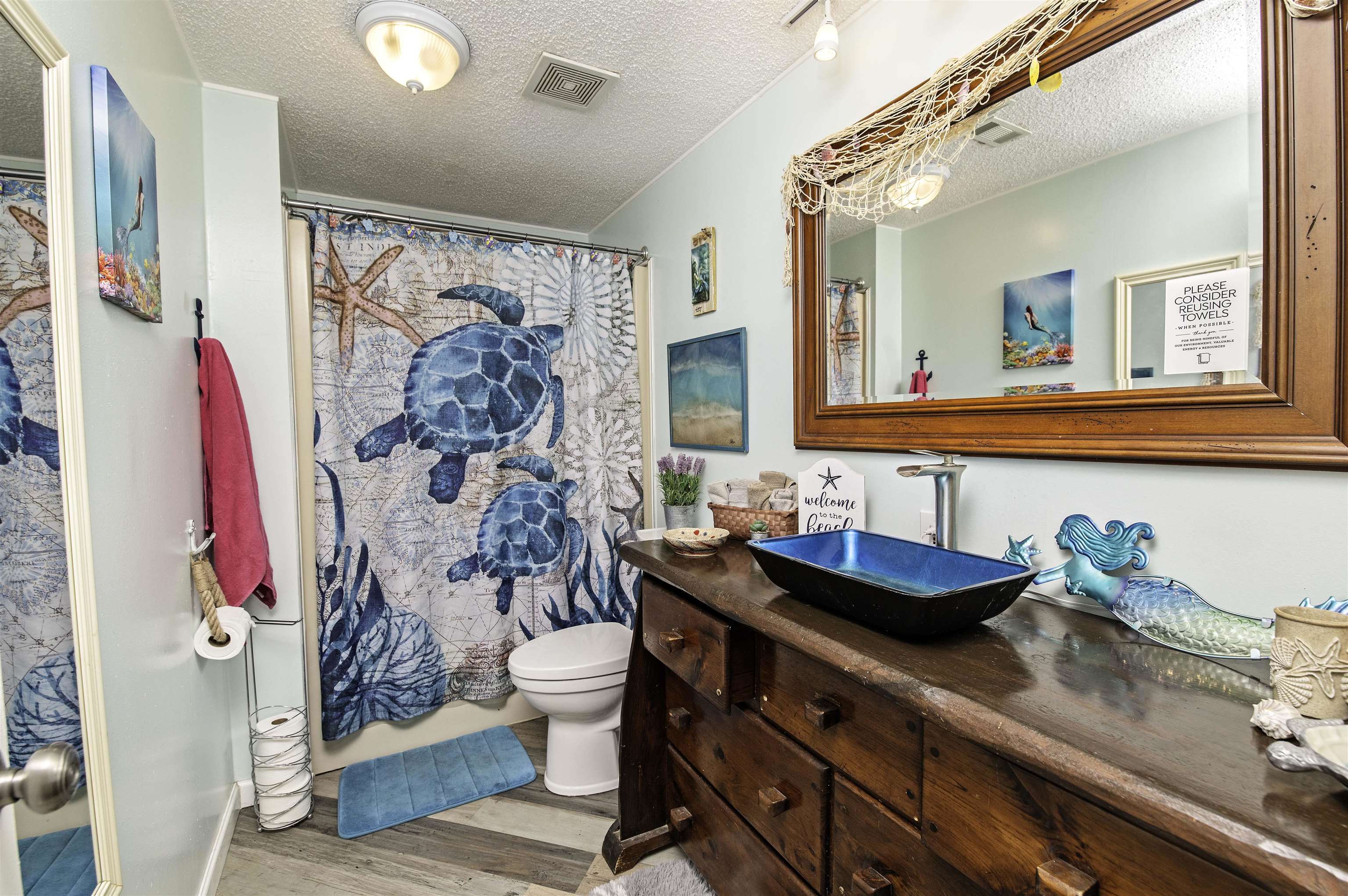266 Pizarro Road St. Augustine, FL 32080 - Photo 20 of 26 a bathroom with a sink and a mirror
