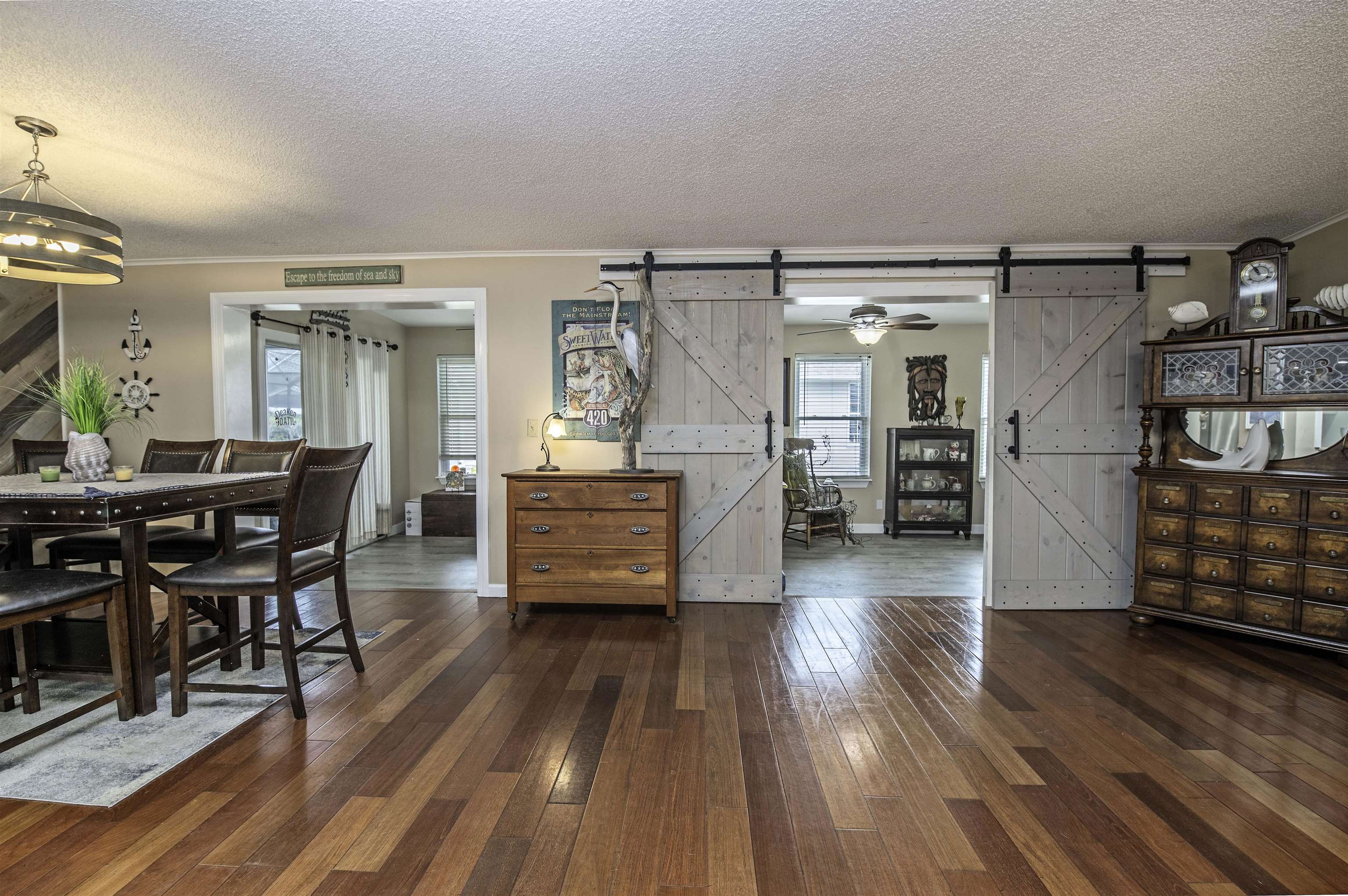 266 Pizarro Road St. Augustine, FL 32080 - Photo 5 of 26 a dining room with furniture and wooden floor