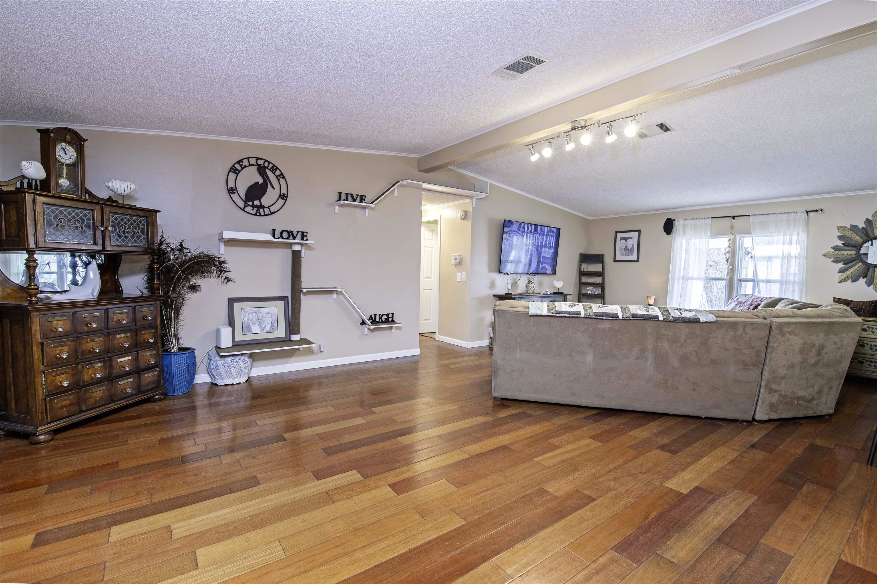 266 Pizarro Road St. Augustine, FL 32080 - Photo 6 of 26 a living room with furniture and wooden floor