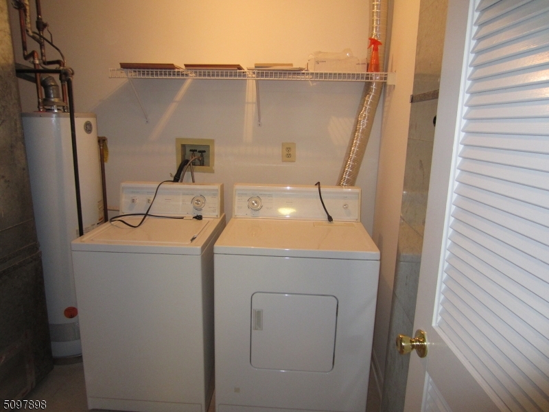 164 Vista Drive Cedar Knolls, NJ 07927 - Photo 7 of 19 a utility room with dryer and washer