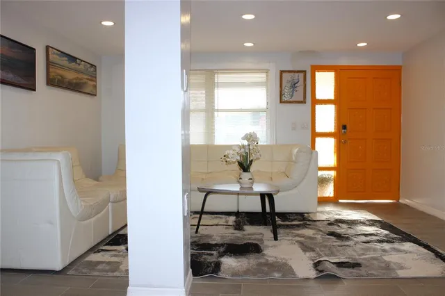 a kitchen with stainless steel appliances granite countertop a stove and a refrigerator