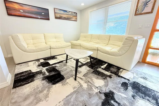 a bathroom with a sink toilet and mirror