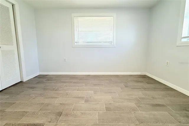 a bathroom with a sink toilet and a mirror