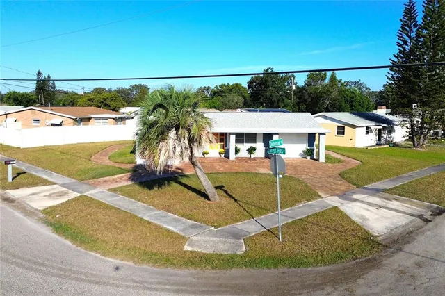 a view of a house with swimming pool