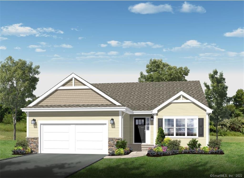 46 Eleanor Road, Unit 46 Somers, CT 06071 - Photo 1 of 1 a front view of a house with a yard and garage