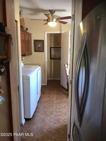 a view of swimming pool with chairs