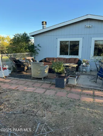 a view of a yard with swimming pool