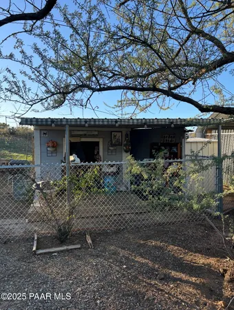 a house view with a backyard