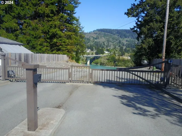 a view of a fence and a balcony