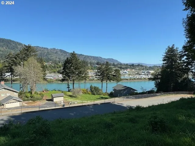 a view of a garden with mountains