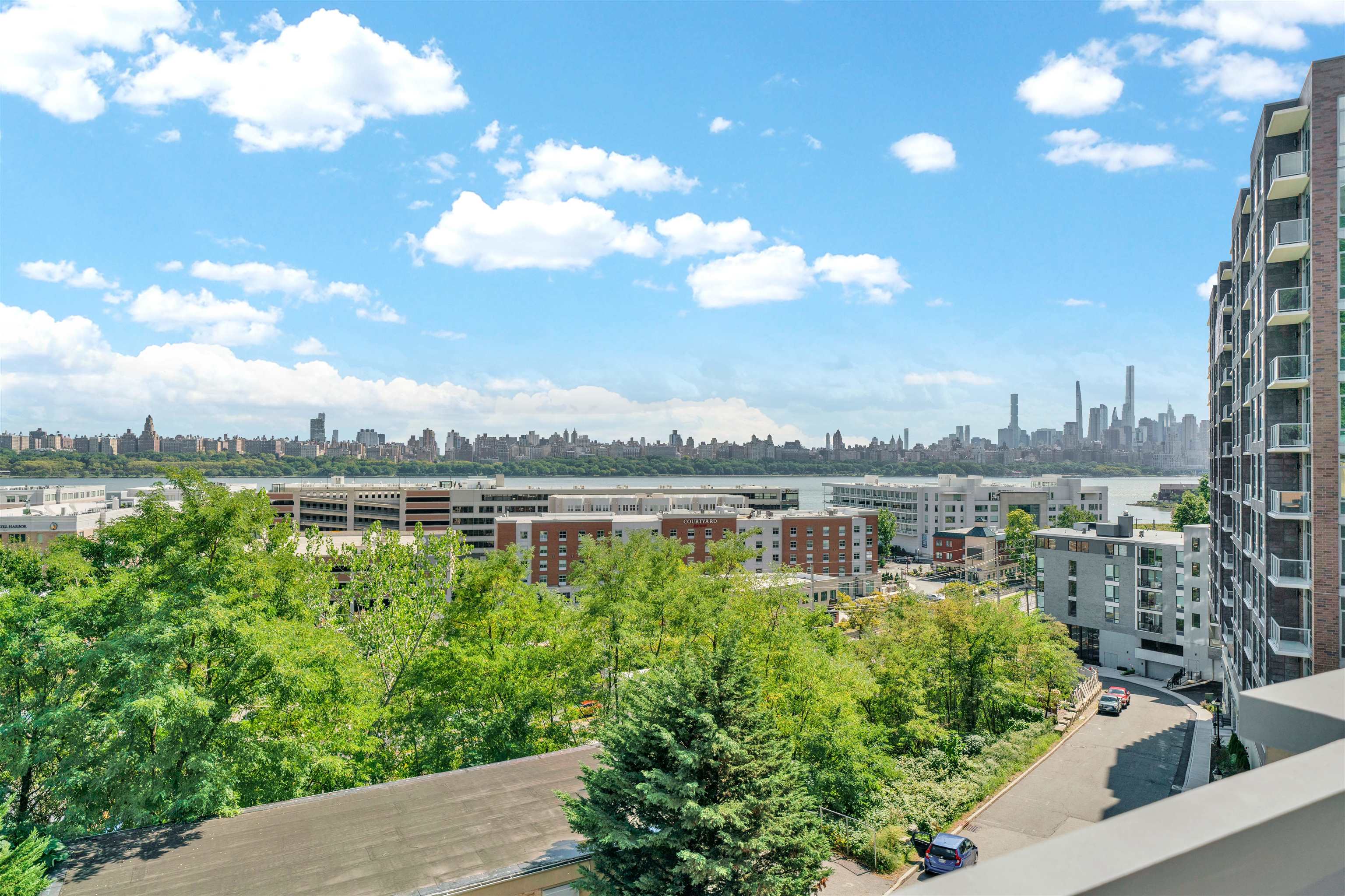8713-6 Churchill Road, Unit 6 North Bergen, NJ 07047 - Photo 13 of 23 a view of a lake with a city