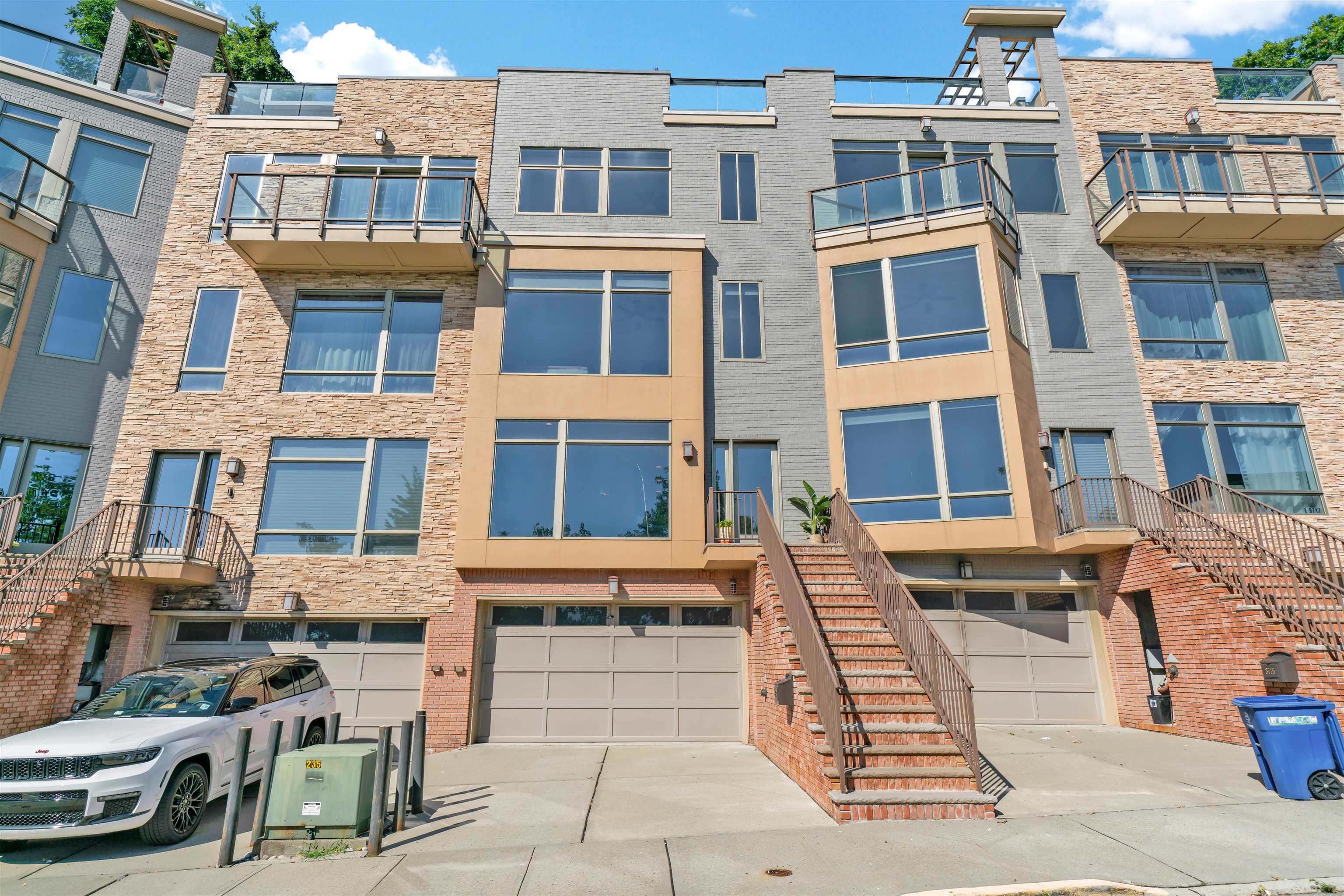 8713-6 Churchill Road, Unit 6 North Bergen, NJ 07047 - Photo 23 of 23 a front view of a building with many windows