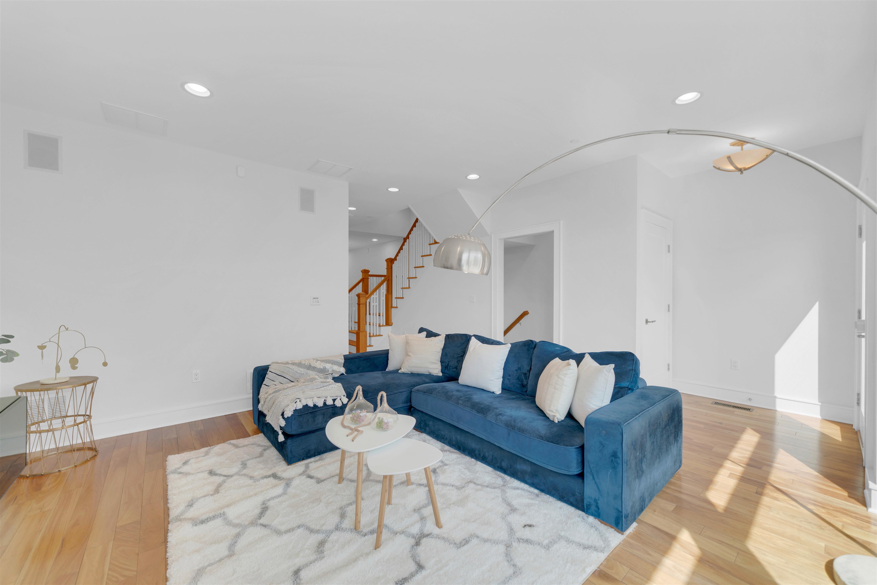 8713-6 Churchill Road, Unit 6 North Bergen, NJ 07047 - Photo 4 of 23 a living room with furniture and wooden floor
