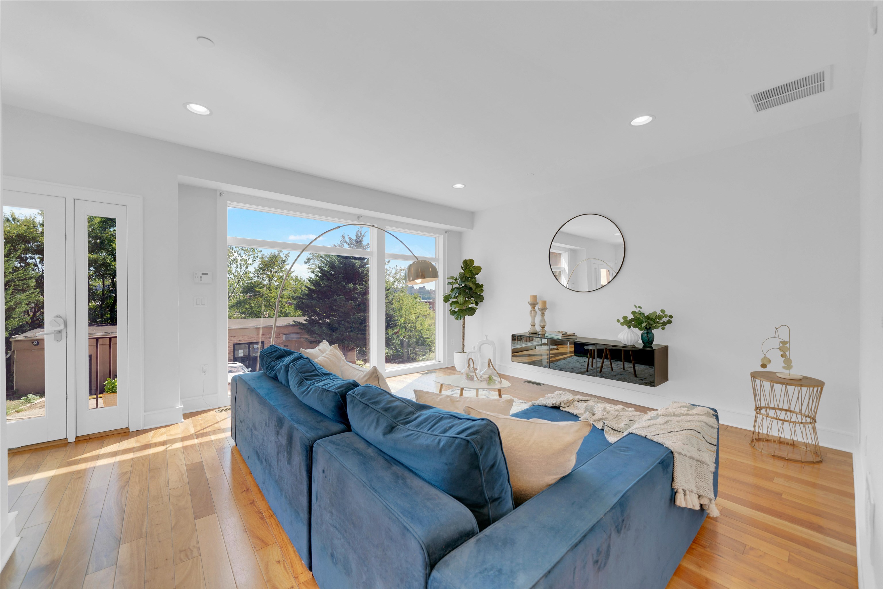 8713-6 Churchill Road, Unit 6 North Bergen, NJ 07047 - Photo 6 of 23 a living room with furniture and a large window