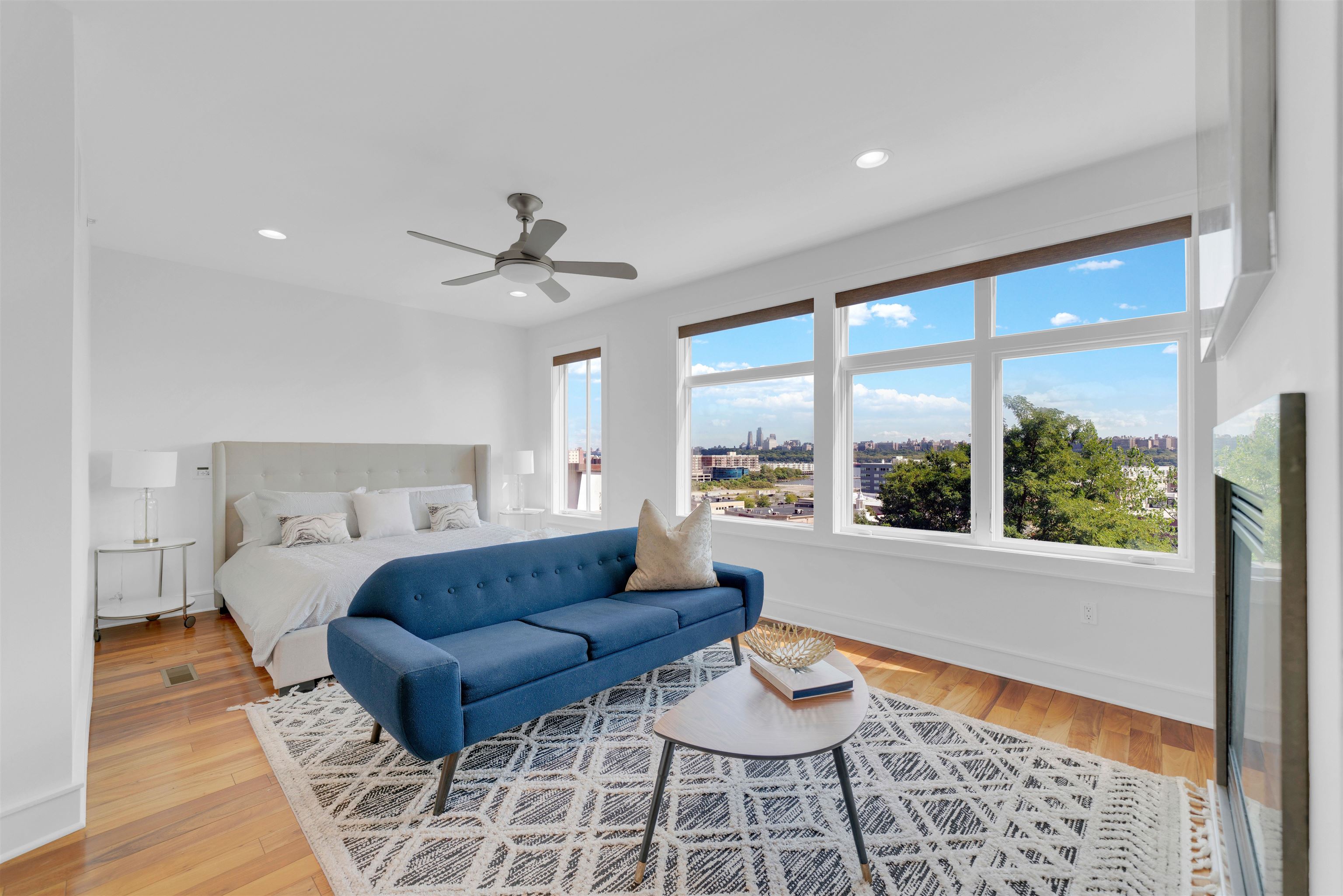 8713-6 Churchill Road, Unit 6 North Bergen, NJ 07047 - Photo 9 of 23 a living room with furniture and a large window
