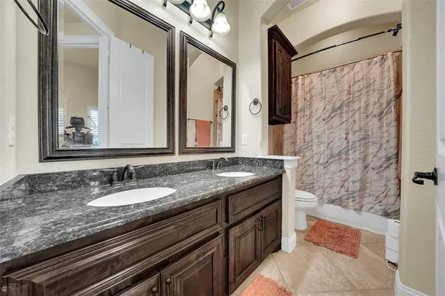 a utility room with cabinets