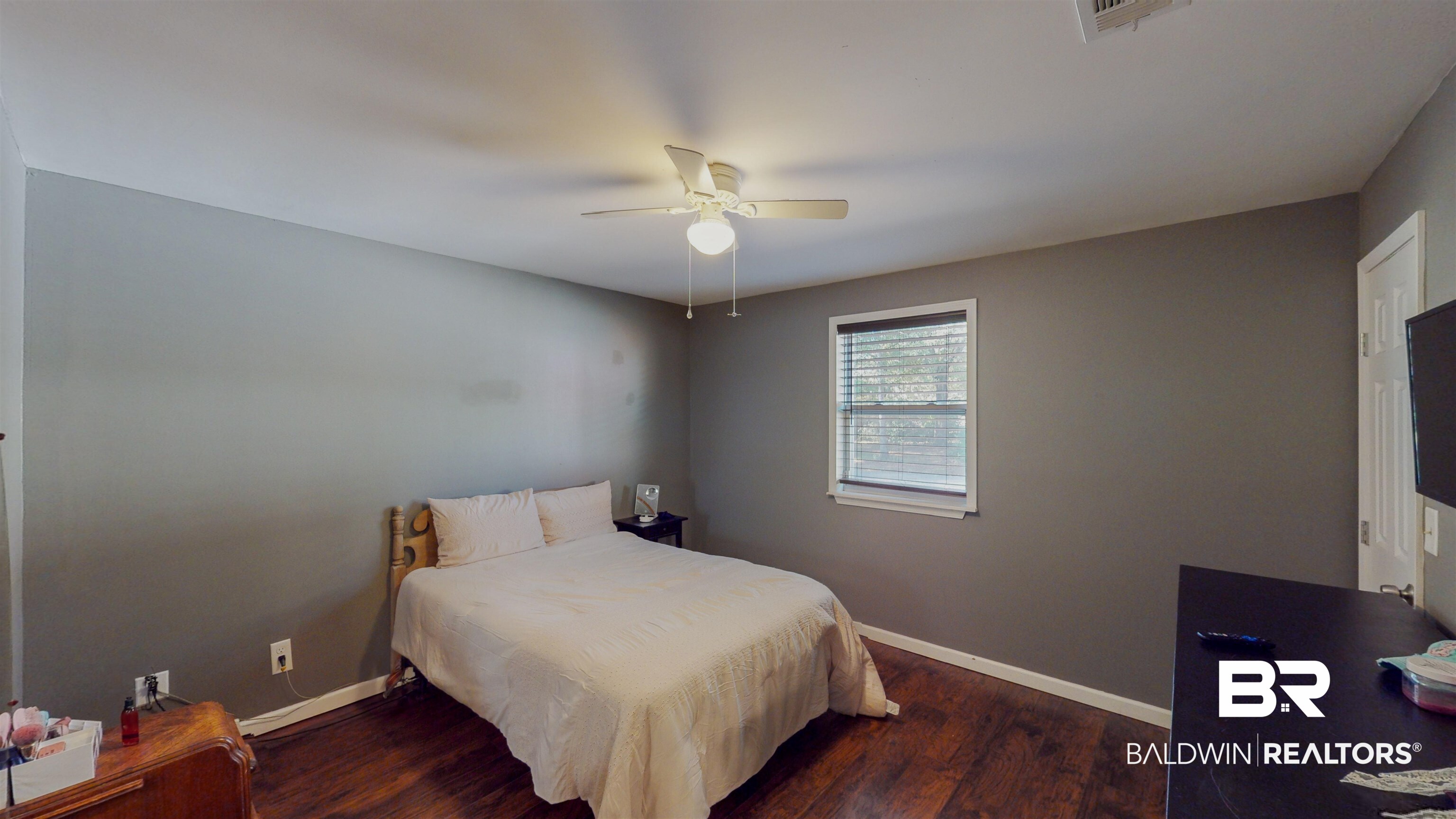 19365 Keller Road Foley, AL 36535 - Photo 20 of 41 Bedroom featuring ceiling fan and dark wood-type flooring