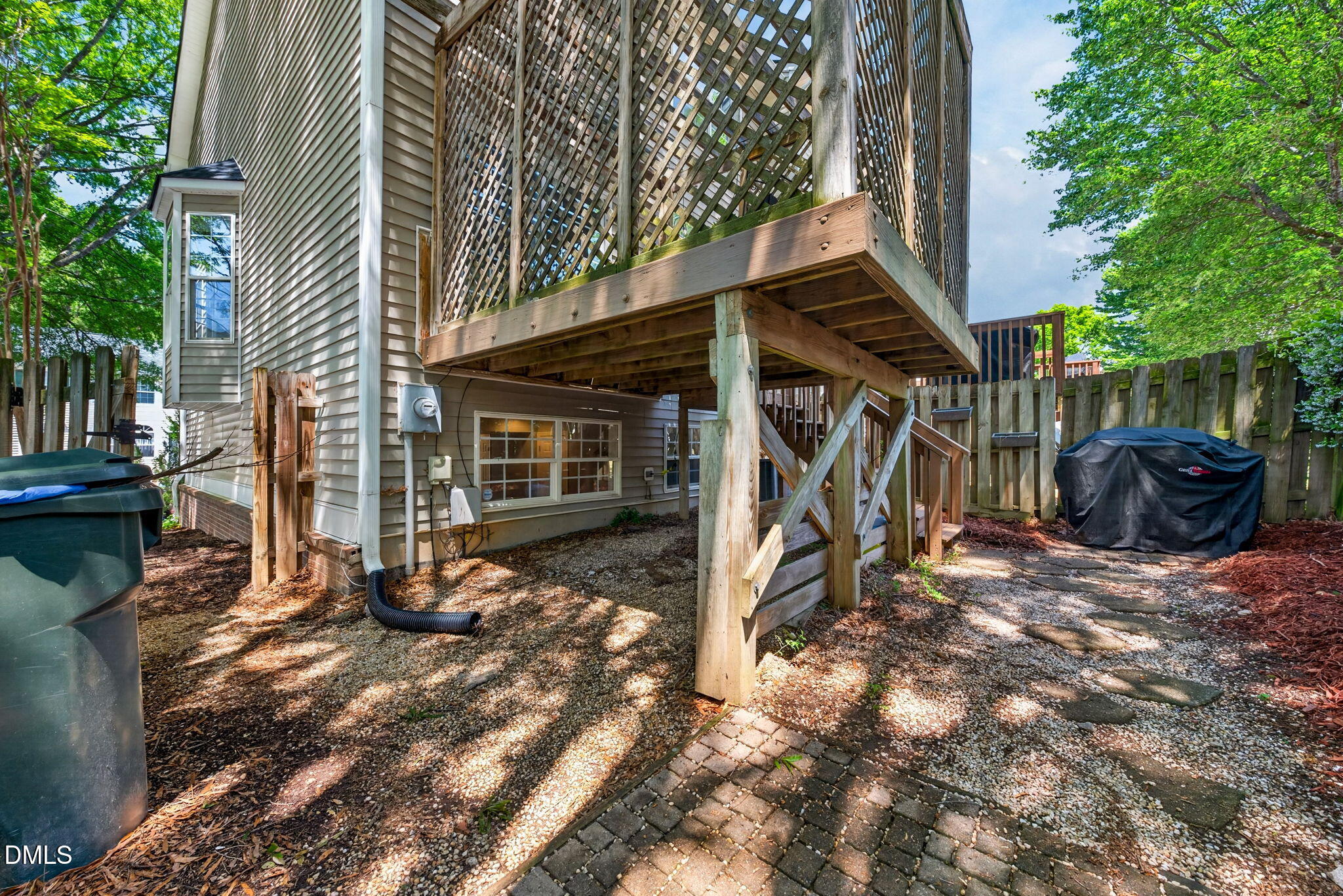 5500 Vista View Court Raleigh, NC 27612 - Photo 36 of 38 a view of a house with a yard and sitting area